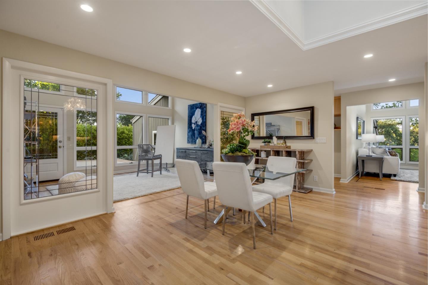 15076 Elm Park Monte Sereno, CA 95030 - Photo 25 of 68 a dining room with furniture and wooden floor