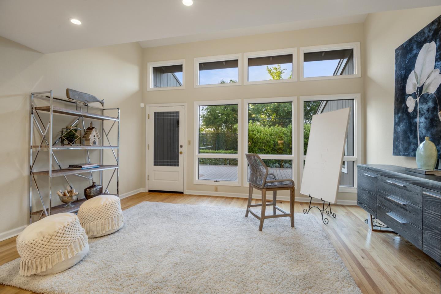 15076 Elm Park Monte Sereno, CA 95030 - Photo 26 of 68 a living room with furniture and a floor to ceiling window