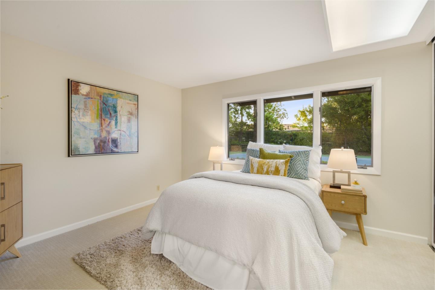 15076 Elm Park Monte Sereno, CA 95030 - Photo 45 of 68 a bedroom with a bed and a large window