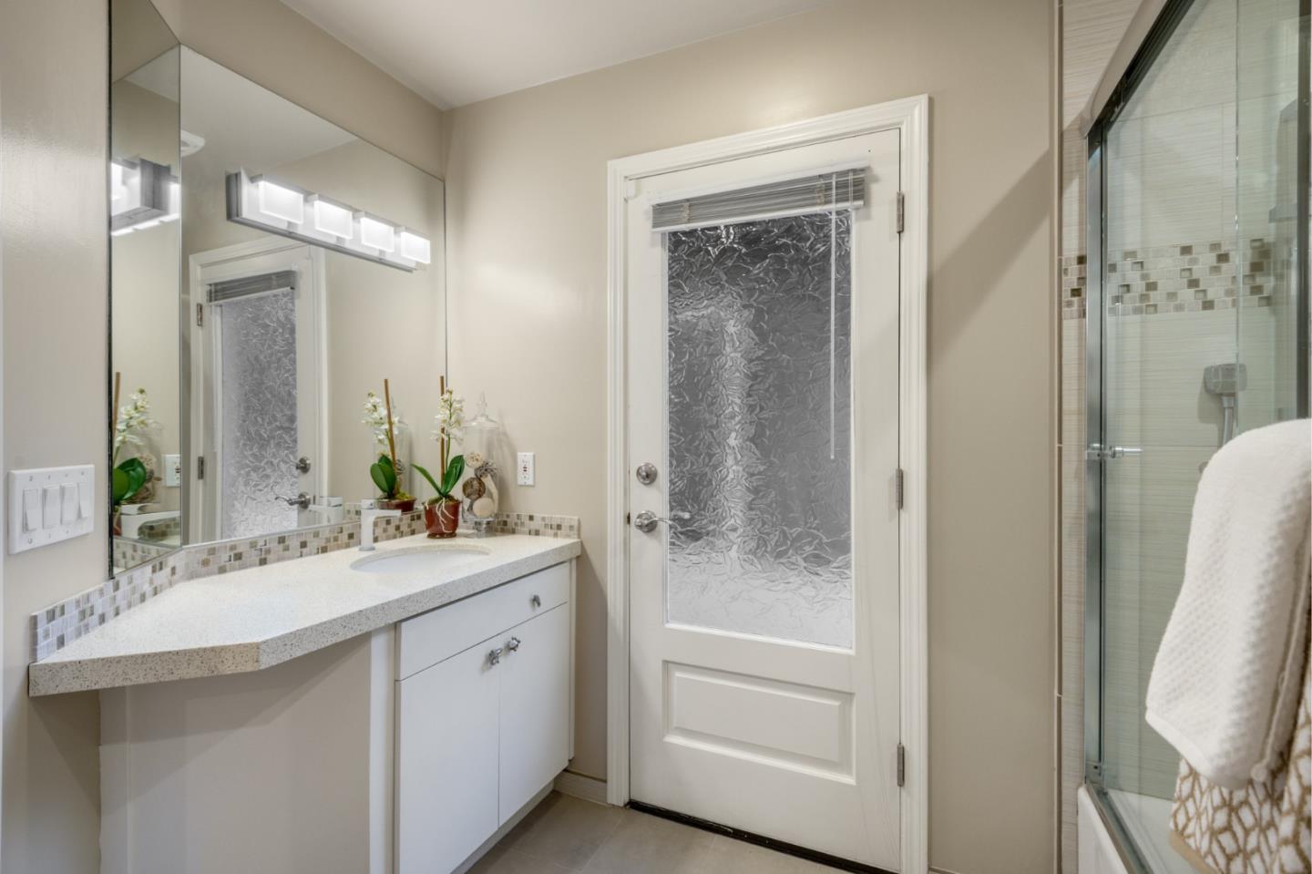 15076 Elm Park Monte Sereno, CA 95030 - Photo 47 of 68 a bathroom with a double vanity sink mirror and bathtub