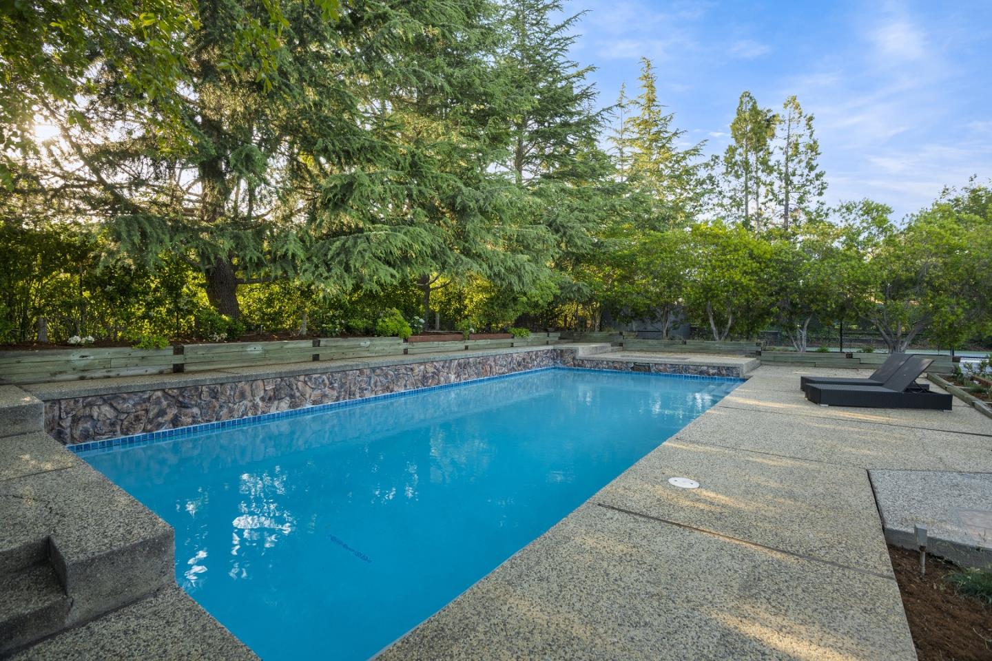 15076 Elm Park Monte Sereno, CA 95030 - Photo 50 of 68 a view of a swimming pool with a yard