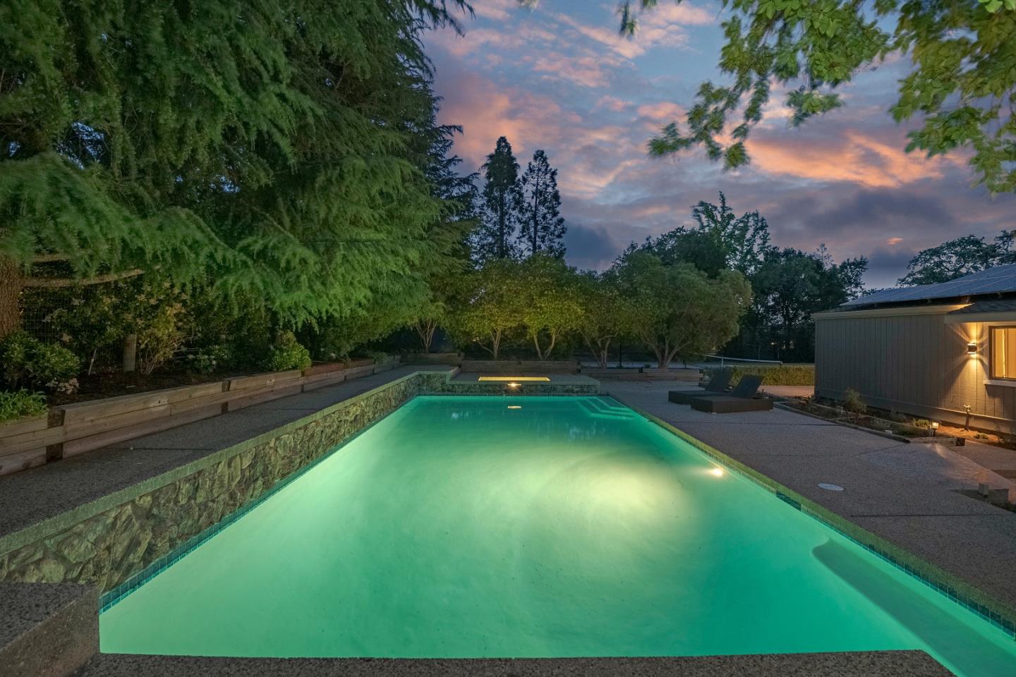 15076 Elm Park Monte Sereno, CA 95030 - Photo 51 of 68 a view of a swimming pool with a yard
