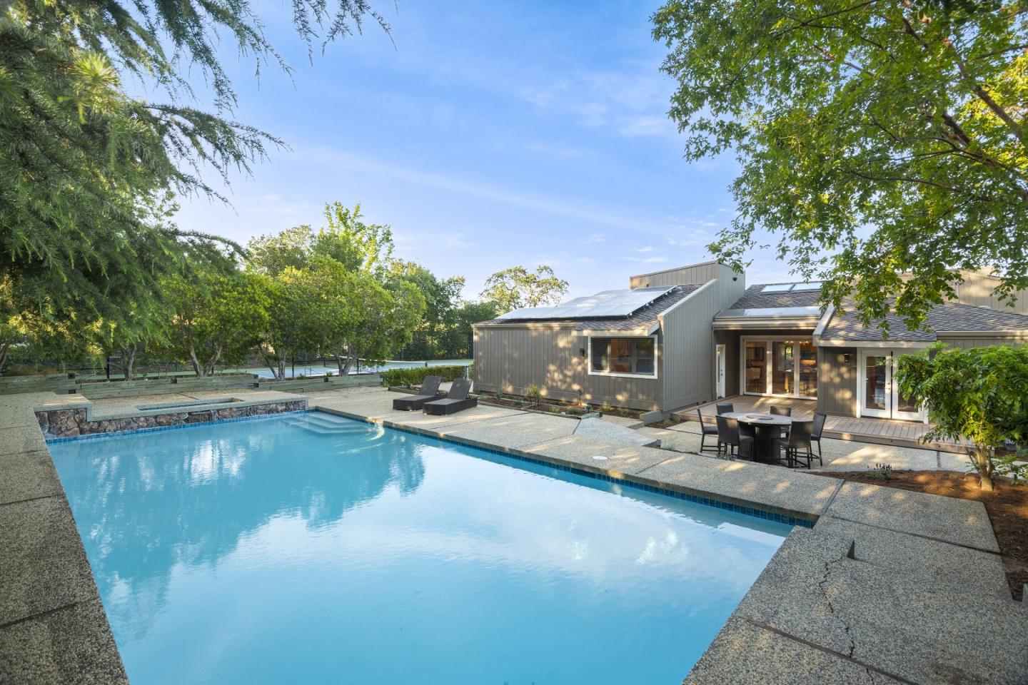 15076 Elm Park Monte Sereno, CA 95030 - Photo 52 of 68 a view of a house with swimming pool and sitting area