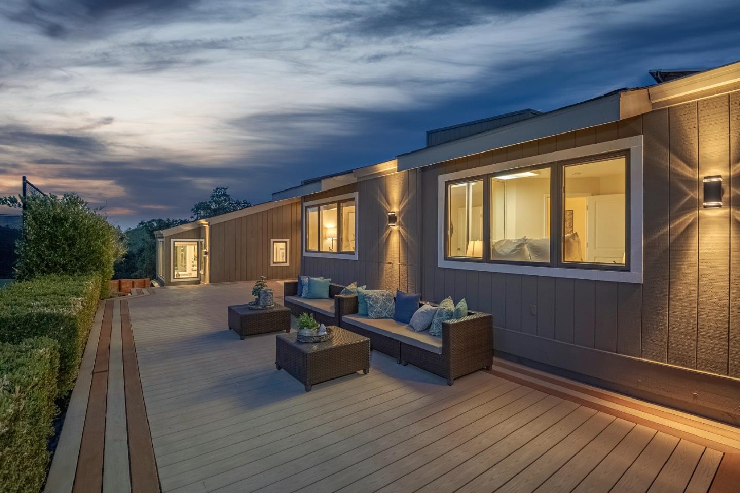 15076 Elm Park Monte Sereno, CA 95030 - Photo 53 of 68 a living room with furniture and a fireplace