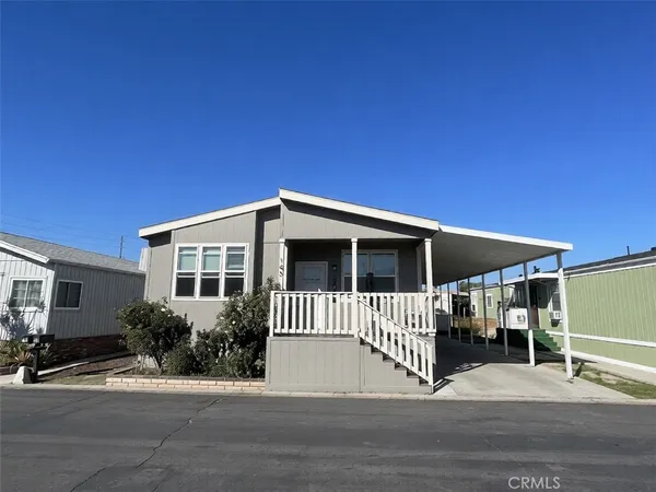 a front view of a house with garage