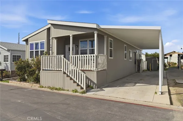 a front view of a house with a garage