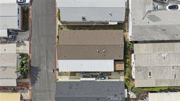 a view of a chair and table in the balcony