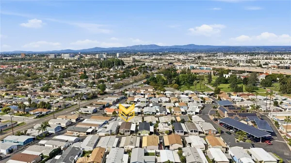 an aerial view of a city with lots of residential buildings