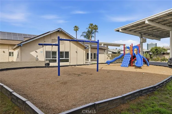 a kitchen with a stove and a microwave