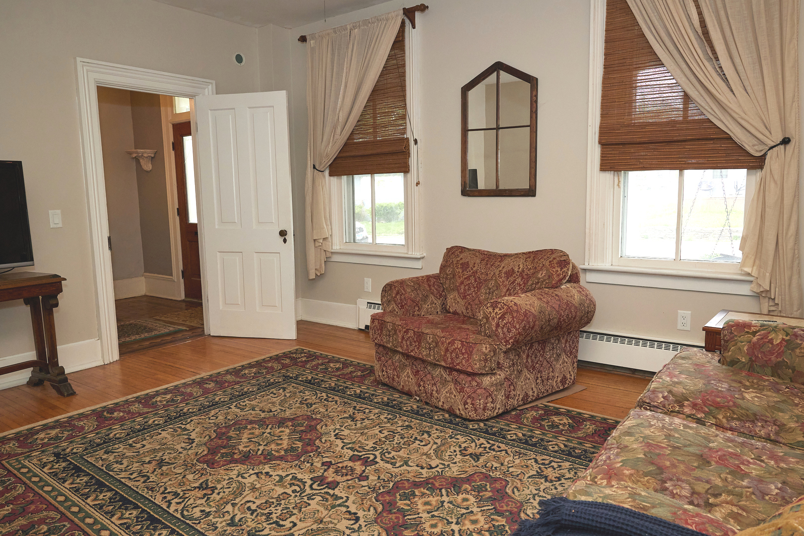 1406 Bluff Street Peru, IL 61354 - Photo 16 of 57 a living room with furniture and a rug