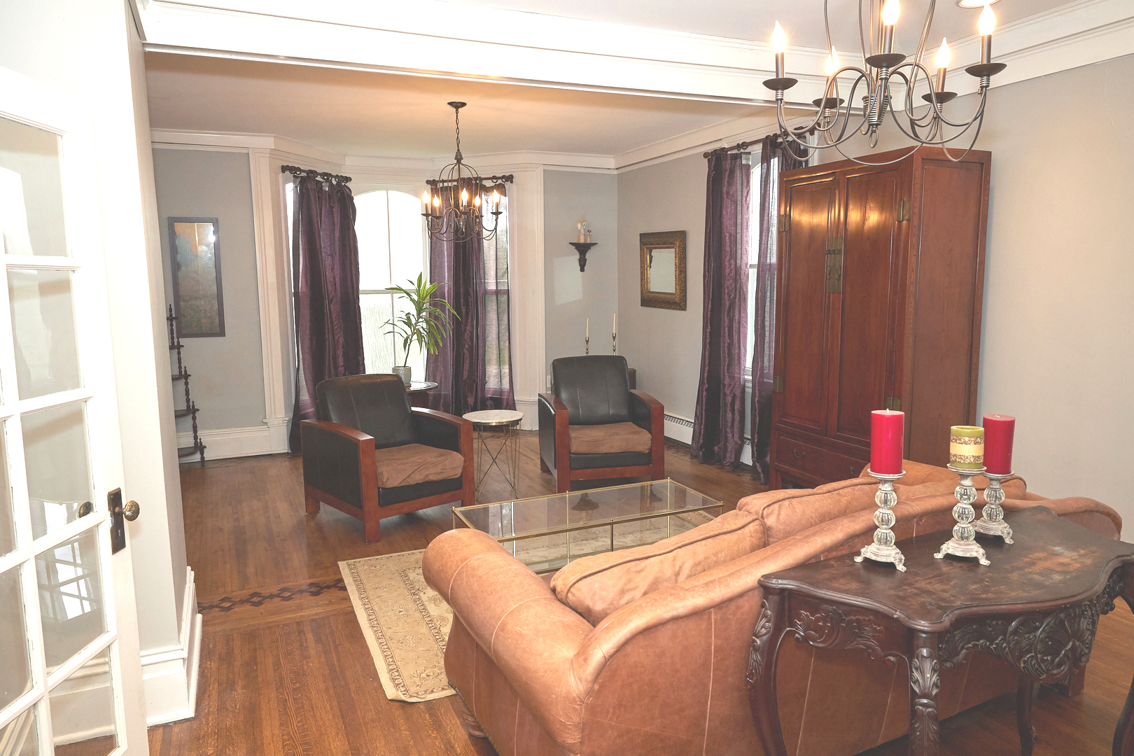 1406 Bluff Street Peru, IL 61354 - Photo 21 of 57 a living room with a chandelier furniture and a chandelier