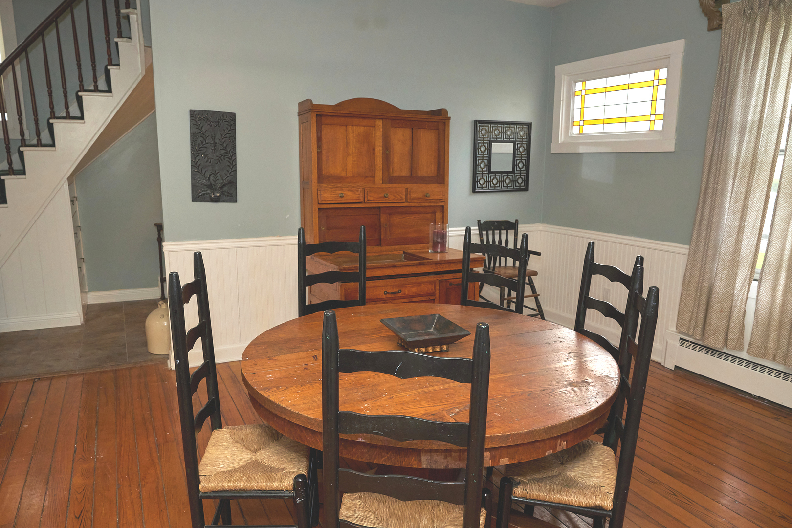 1406 Bluff Street Peru, IL 61354 - Photo 22 of 57 a view of a dining room with furniture window and wooden floor