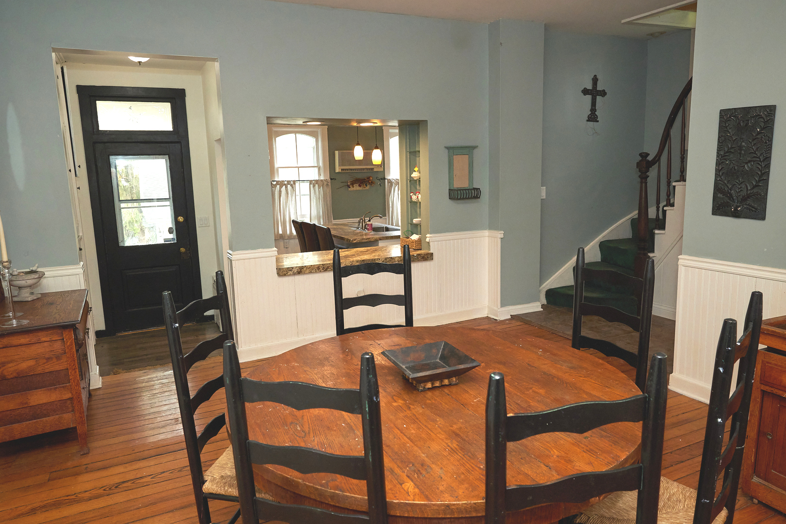 1406 Bluff Street Peru, IL 61354 - Photo 24 of 57 a view of a dining room with furniture and wooden floor