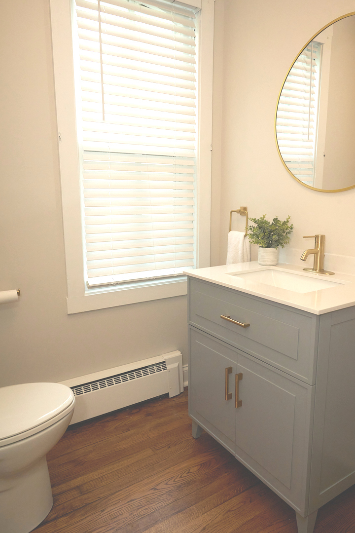 1406 Bluff Street Peru, IL 61354 - Photo 34 of 57 a bathroom with a sink and a mirror