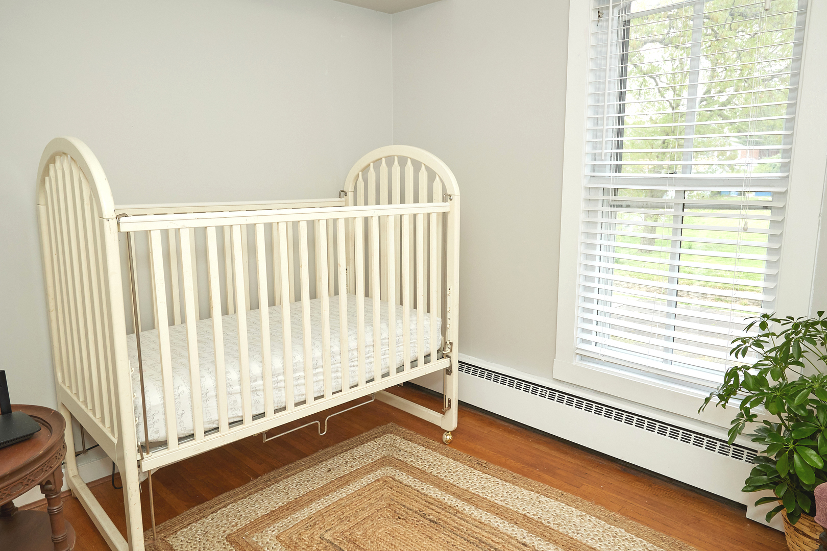 1406 Bluff Street Peru, IL 61354 - Photo 36 of 57 a view of a room with wooden floor and a window