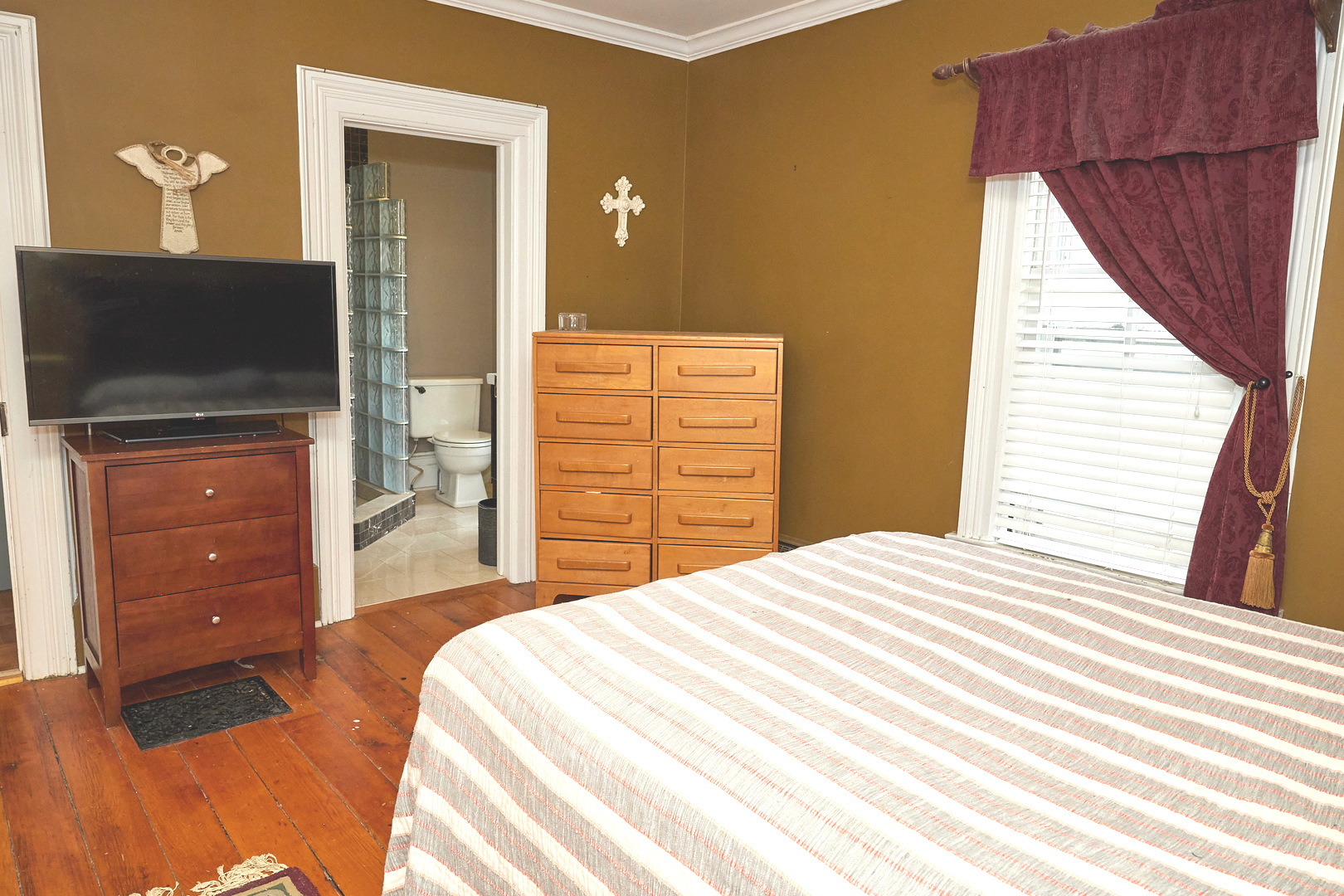 1406 Bluff Street Peru, IL 61354 - Photo 41 of 57 a bedroom with a bed and a flat screen tv