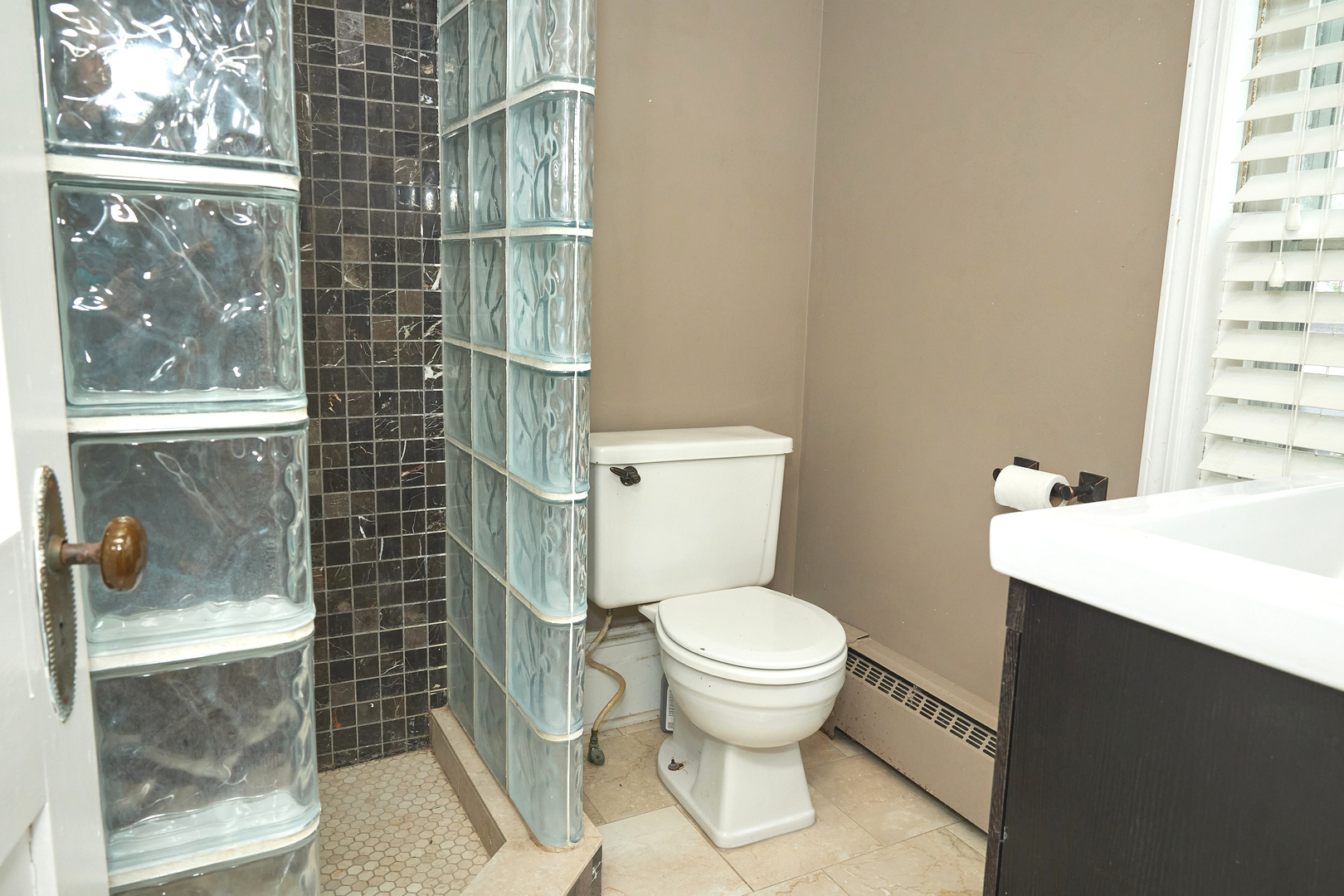 1406 Bluff Street Peru, IL 61354 - Photo 42 of 57 a bathroom with a toilet and a shower