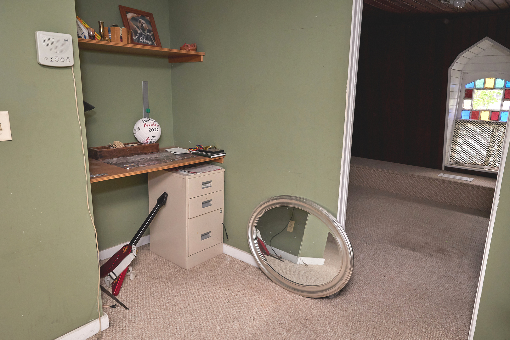 1406 Bluff Street Peru, IL 61354 - Photo 49 of 57 a room with a stove and a mirror