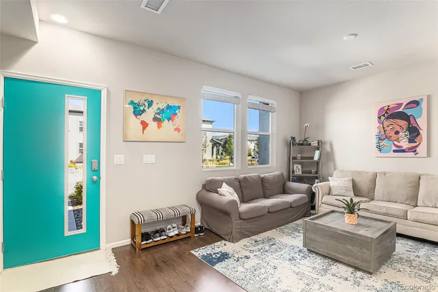 a dinning table and chairs in a room