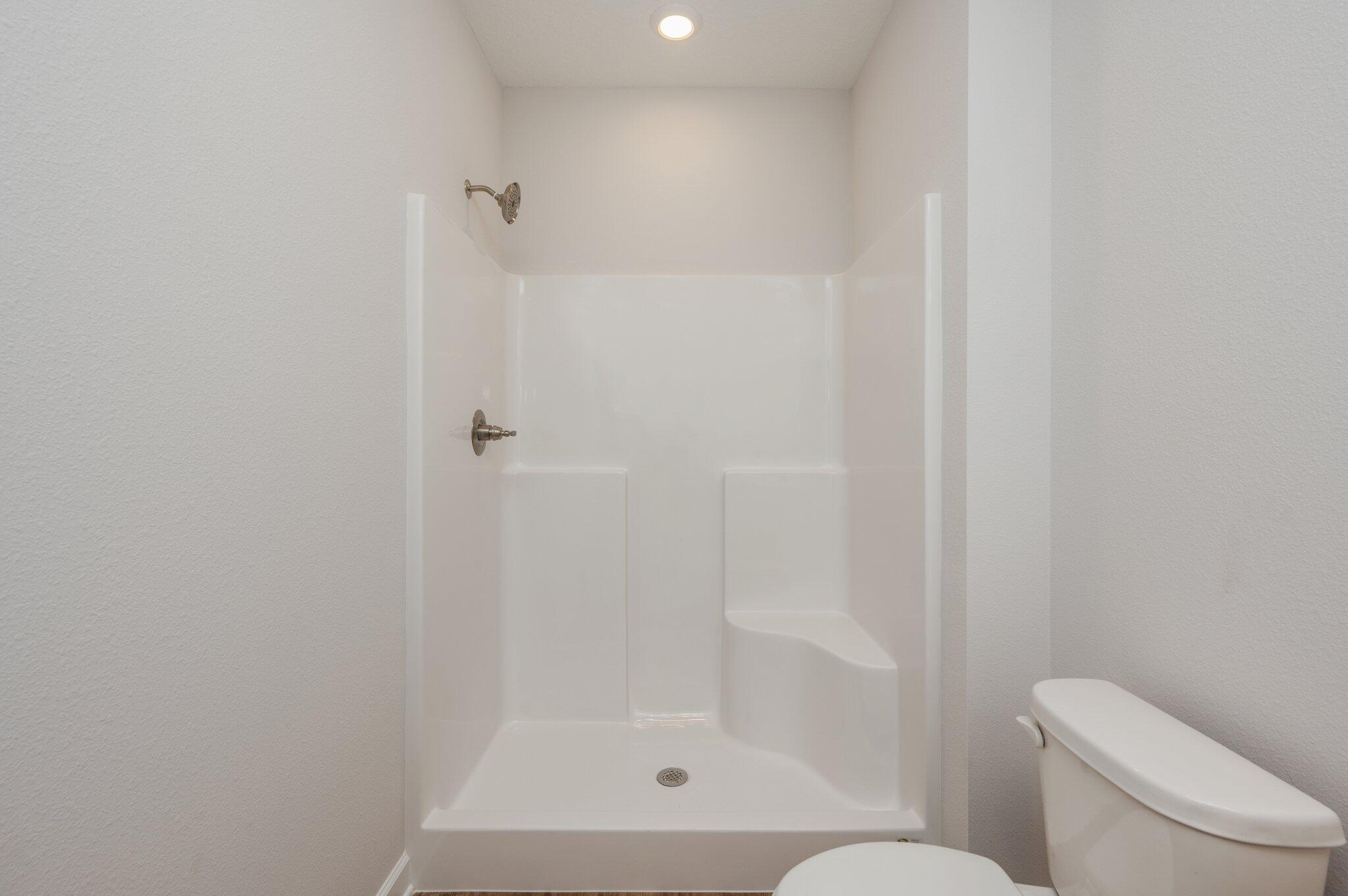 3929 Poverty Creek Road Crestview, FL 32539 - Photo 21 of 37 a bathroom with a shower and toilet