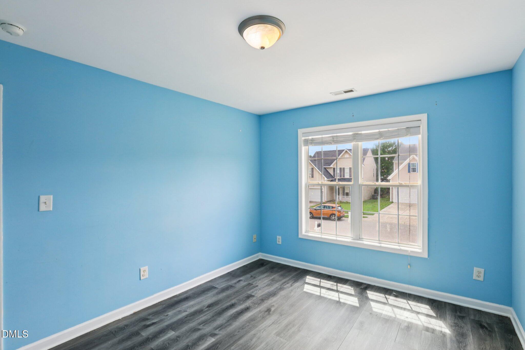 1212 Southgate Drive Raleigh, NC 27610 - Photo 24 of 31 an empty room with windows