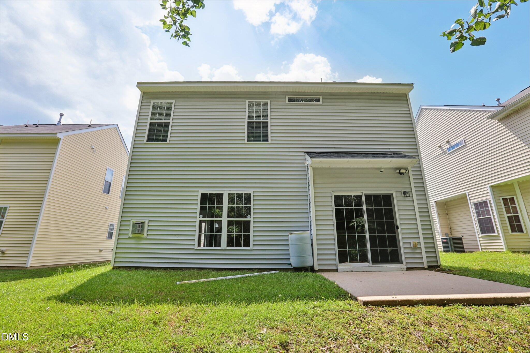 1212 Southgate Drive Raleigh, NC 27610 - Photo 29 of 31 a front view of a house with a yard and garage