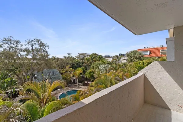 a view of a balcony with an outdoor space