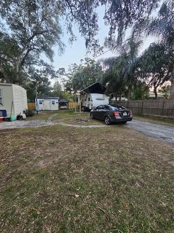 a view of street with parked cars