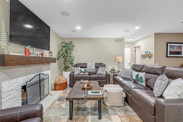 a kitchen with stainless steel appliances granite countertop a sink and cabinets
