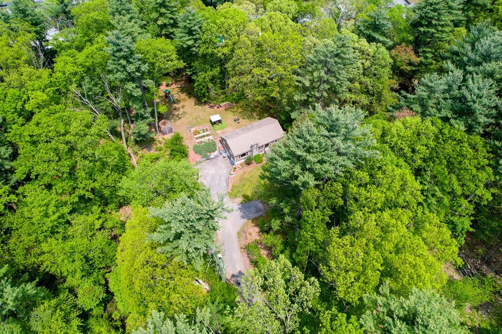 222 Gates Pond Road Berlin, MA 01503 - Photo 27 of 36 an aerial view of a house with a yard