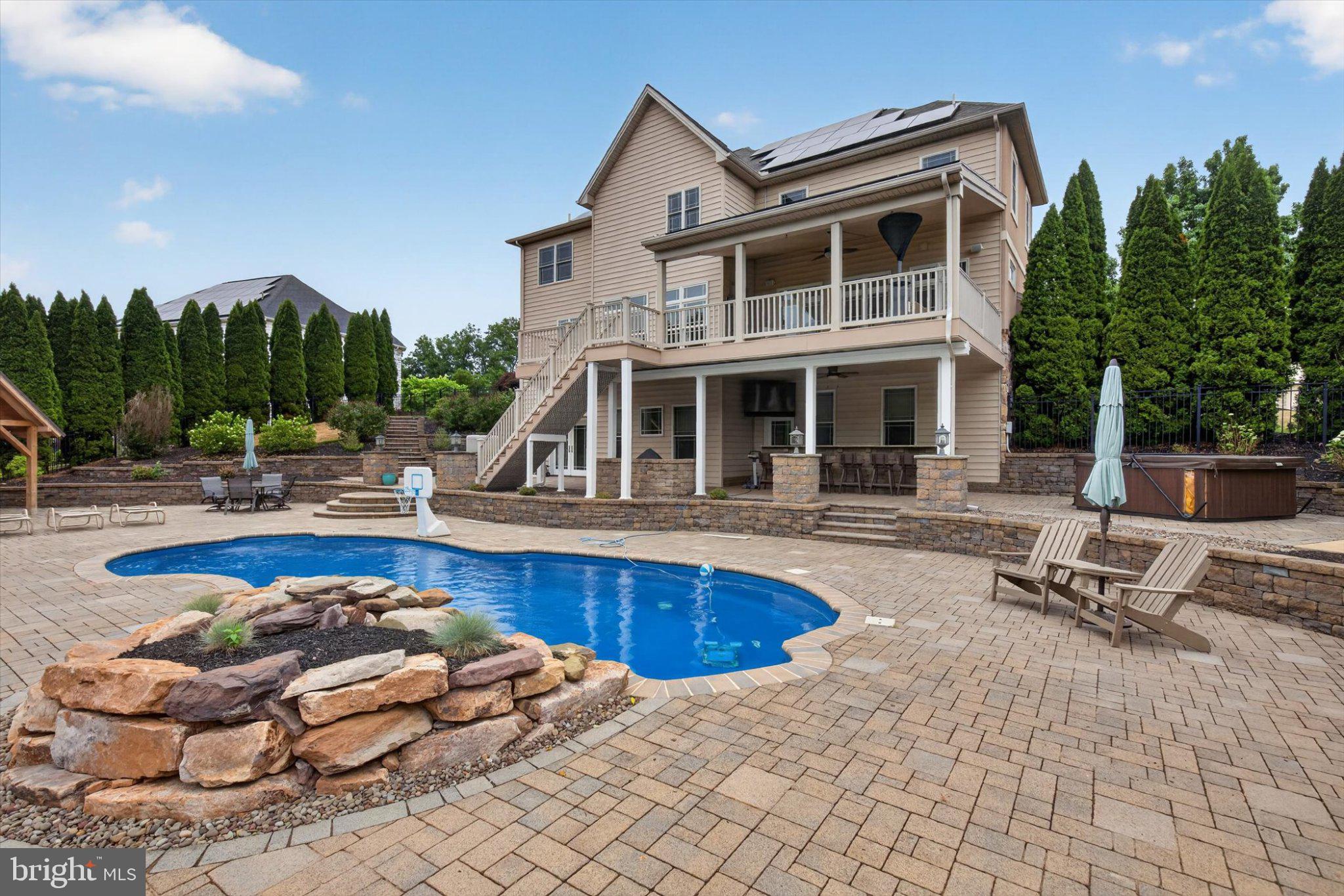 6505 Plowman Ridge Harrisburg, PA 17112 - Photo 58 of 83 Elegant home with a serene pool oasis.