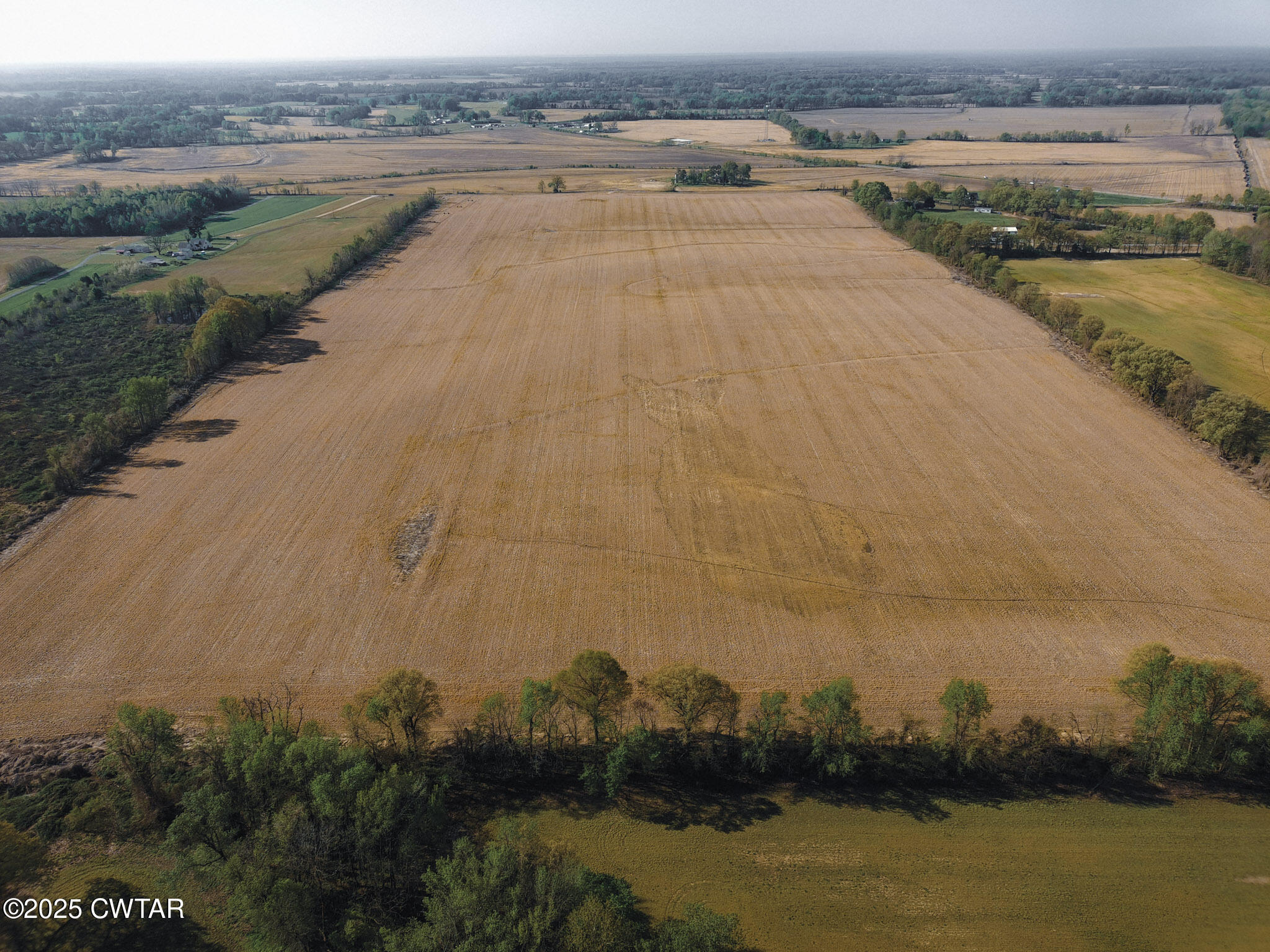 428 Hogan Road Covington, TN 38019 - Photo 8 of 8 an aerial view of valley and lake