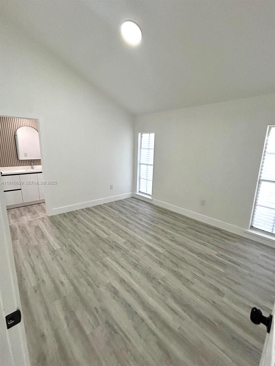 14211 Southwest 286th Street Homestead, FL 33033 - Photo 25 of 38 a view of an empty room and window
