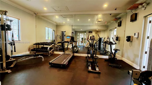 a view of a room with gym equipment