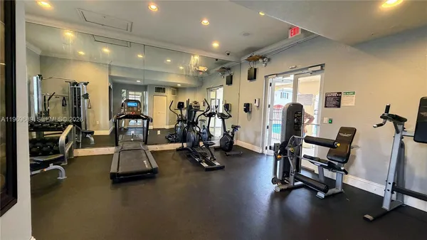 a view of a room with gym equipment
