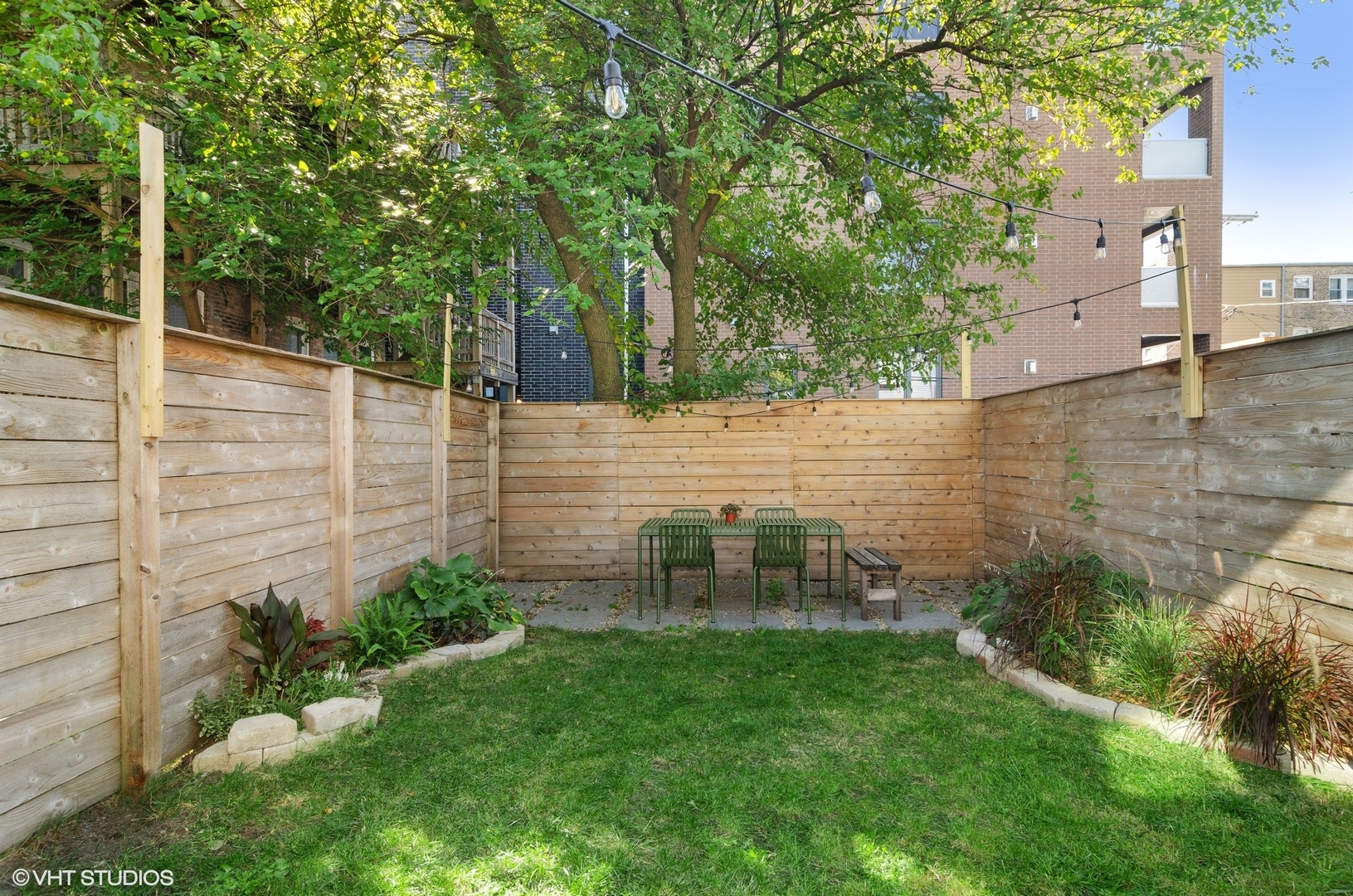2811 West Shakespeare Avenue Chicago, IL 60647 - Photo 3 of 20 a view of yard with patio