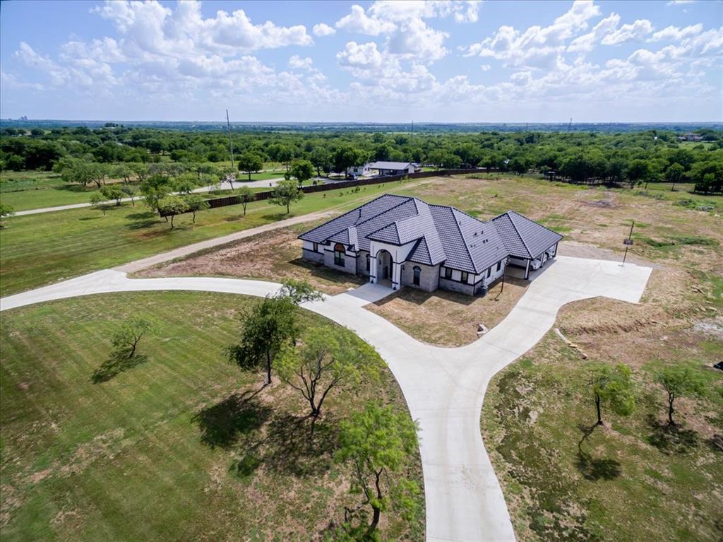 7381 Mesquite Ridge Sanger, TX 76266 - Photo 1 of 40 a view of a swimming pool with a yard