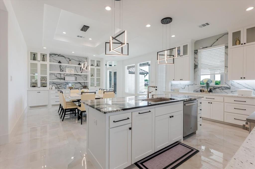 a kitchen with counter space cabinets and appliances