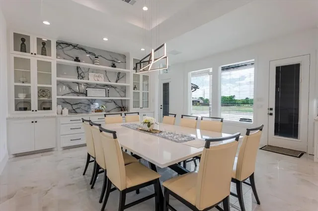 a view of a dining room and livingroom view