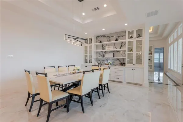 a view of a dining room with furniture