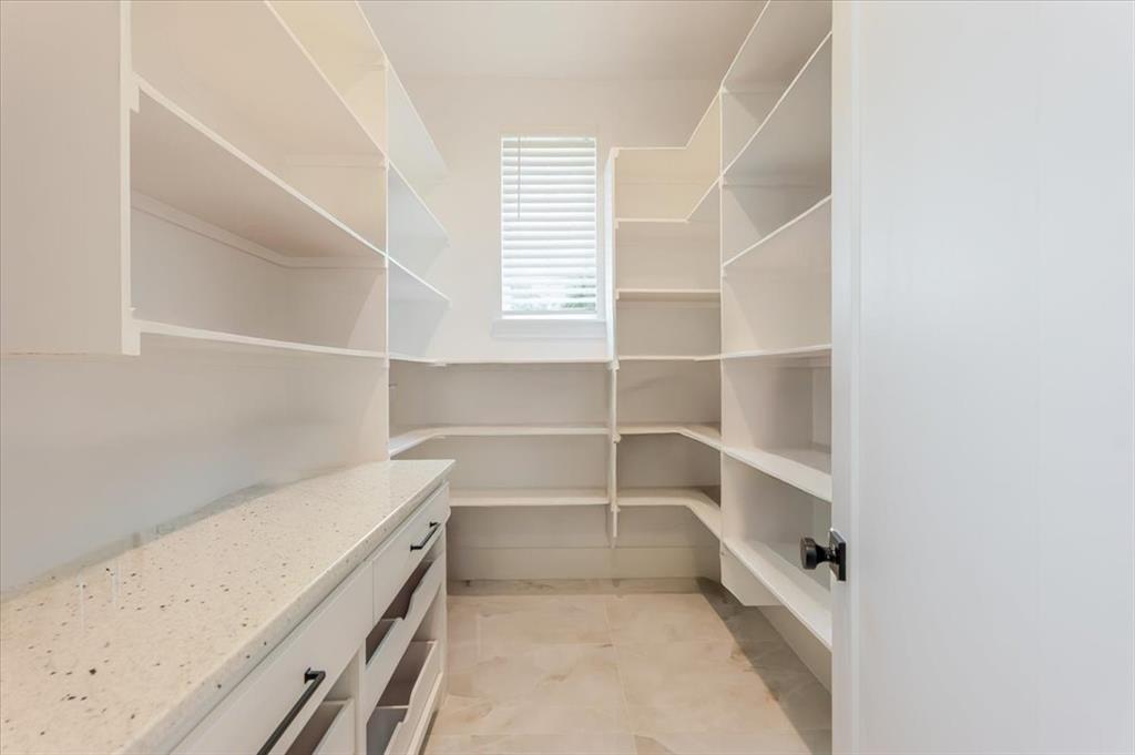 7381 Mesquite Ridge Sanger, TX 76266 - Photo 14 of 40 a view of an empty walk in closet