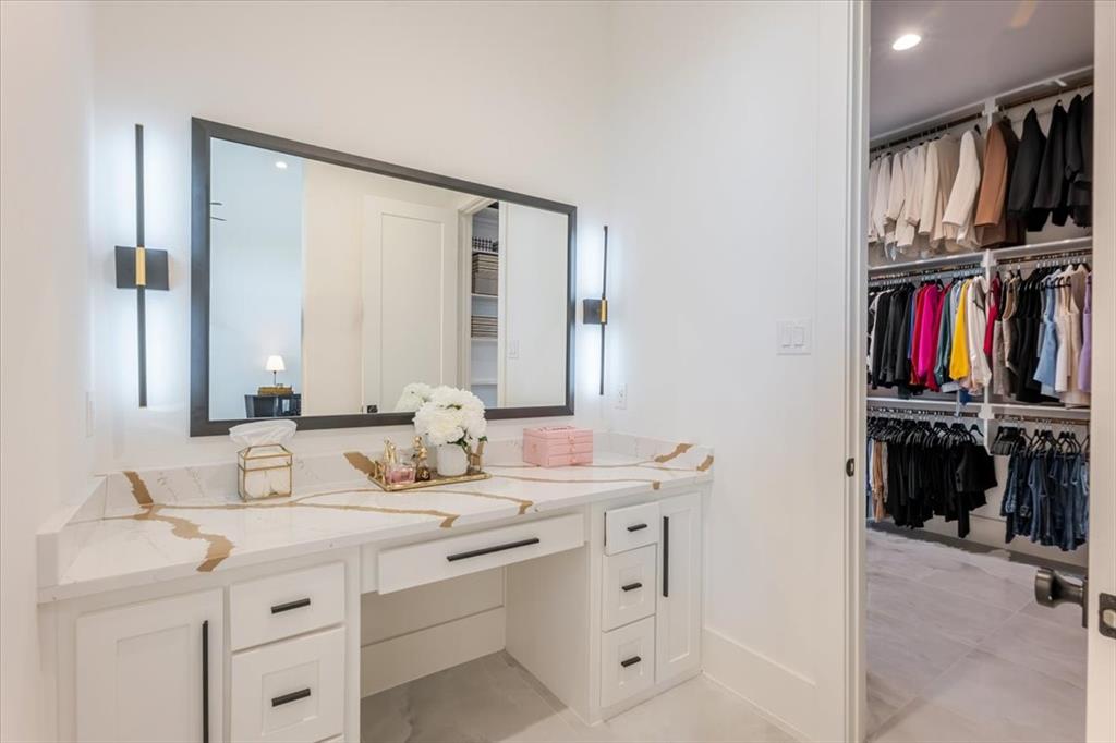 7381 Mesquite Ridge Sanger, TX 76266 - Photo 17 of 40 a bathroom with a sink double vanity and a mirror