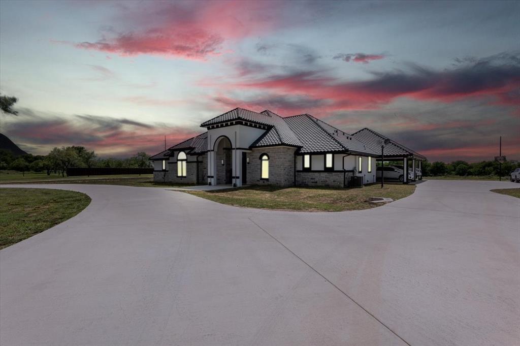 7381 Mesquite Ridge Sanger, TX 76266 - Photo 2 of 40 a view of house with a street