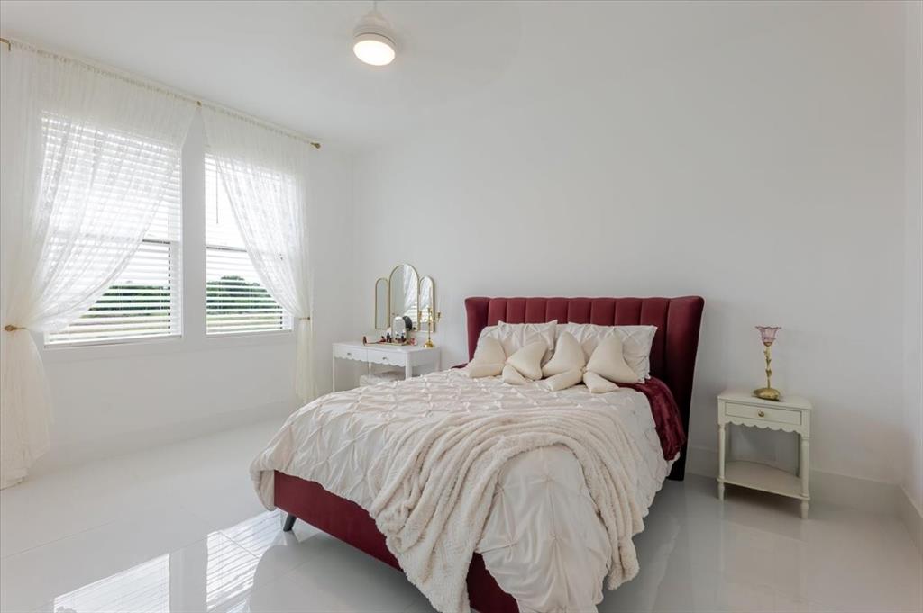 7381 Mesquite Ridge Sanger, TX 76266 - Photo 29 of 40 a bedroom with bed and a window