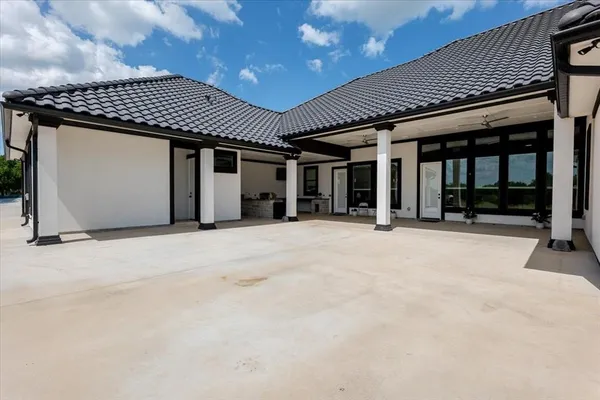a living room with furniture and window