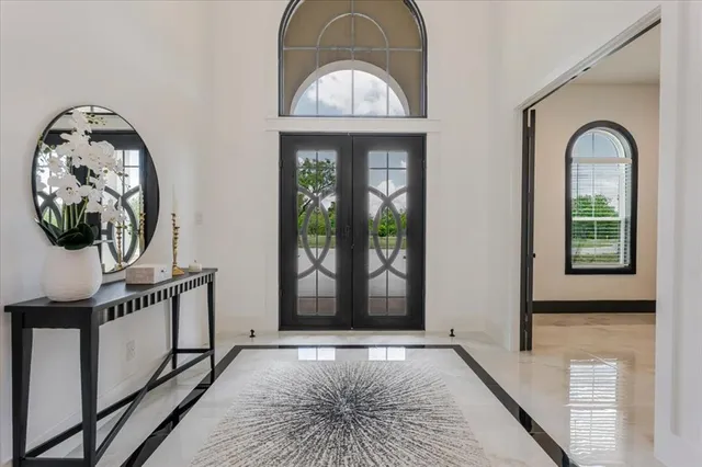 a view of a livingroom with furniture and window