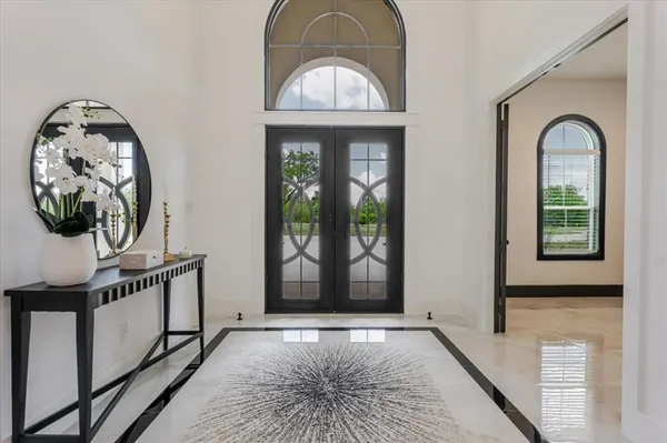 a view of a livingroom with furniture and window