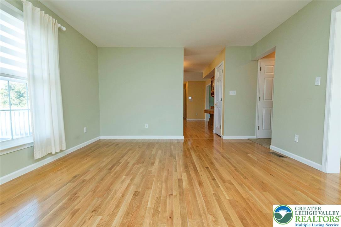 520 5 Points Richmond Road Bangor, PA 18013 - Photo 11 of 48 a view of an empty room with wooden floor and a window