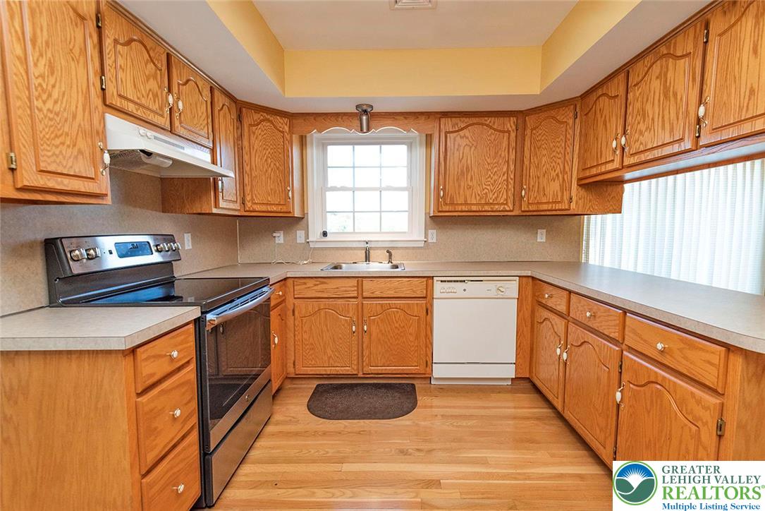 520 5 Points Richmond Road Bangor, PA 18013 - Photo 16 of 48 a kitchen with stainless steel appliances granite countertop a sink a stove and cabinets