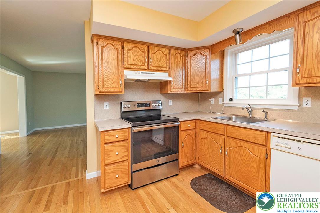 520 5 Points Richmond Road Bangor, PA 18013 - Photo 17 of 48 a kitchen with wooden floors appliances a sink and a window